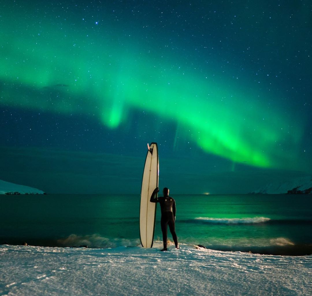 Photo by @Chrisburkard | Looking back on a scene that still doesn’t feel real to me. I dreamed of a surf session under the Northern Lights for years. It took more years of planning and many trips to Iceland to make it happen. Even this trip had been thrown off course by a once in a lifetime storm that ravaged the country, forcing us into a life threatening situation and ultimately changed our itinerary. We thought about leaving empty handed and quitting while we were ahead (alive and safe), but the idea of something like happening this was too strong. To say the least, we made the right call. After chasing it for so long, everything finally came together on one unbelievable night. You can see it all unfold in our short film from the trip, Under an Arctic Sky.
